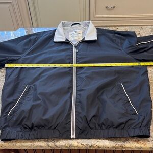 Tommy Bahama Dark Blue Windbreaker with Light Trim. Mint condition. Wash & wear.